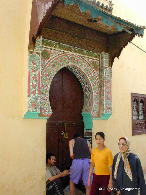 On the steps of the door decorated, Meknes - Morocco