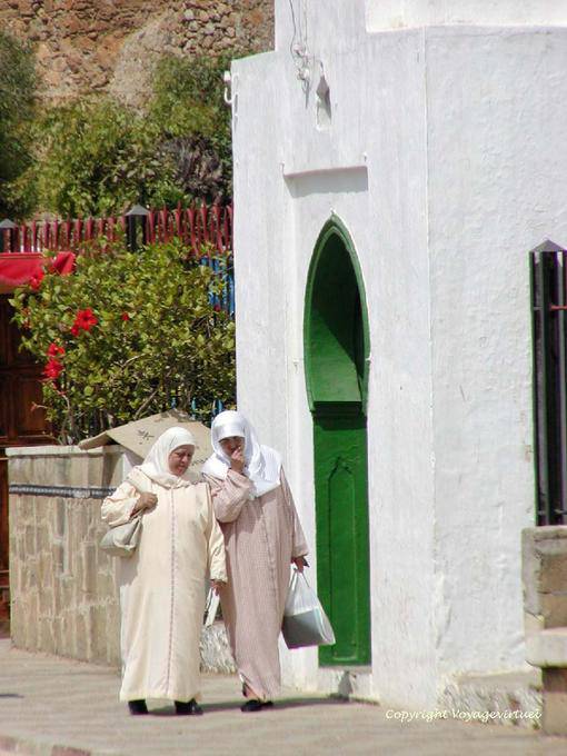 Promenade women in traditional dress, Asilah - Morocco