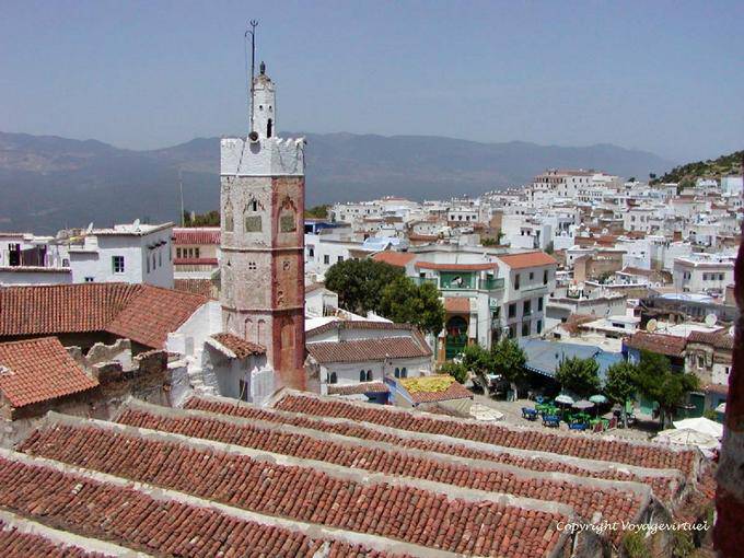 Roofs and the minaret of the Mosque El Masjid El Aadam, Chefchaouen - Morocco