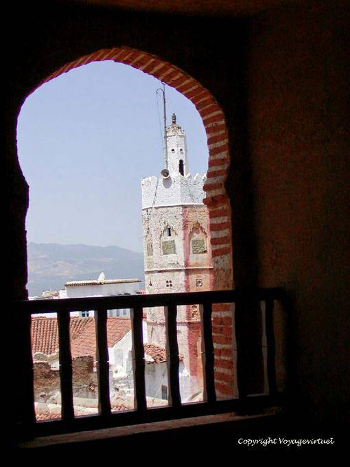 View a minaret from an opening of the Tower of the Kasbah, Chefchaouen - Morocco