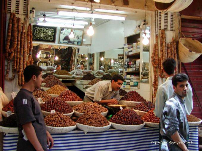 The Merchant of figs and dates in the souk, Fes - Morocco