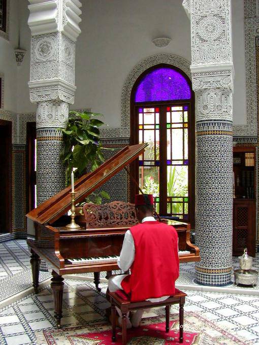 A grand piano in the courtyard of a palace, Fez - Morocco