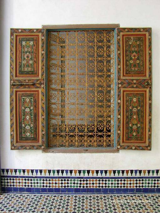 Painted shutters and ironwork of art, Bahia Palace, Marrakech - Morocco
