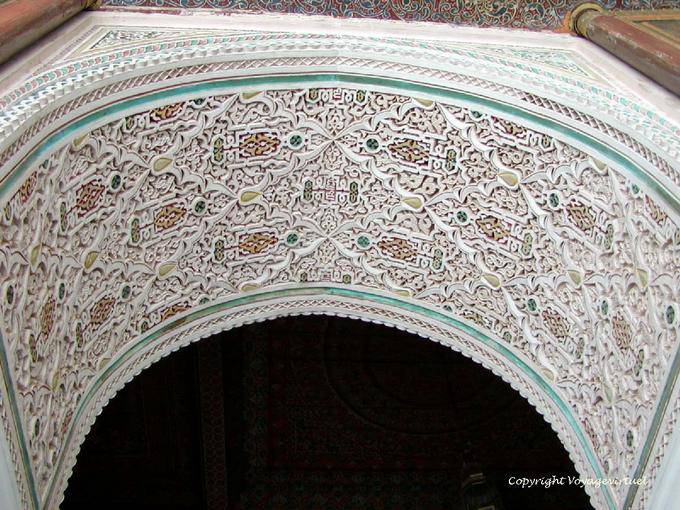 Painted stucco decorating the upper arch of entrance, Bahia Palace, Marrakech - Morocco