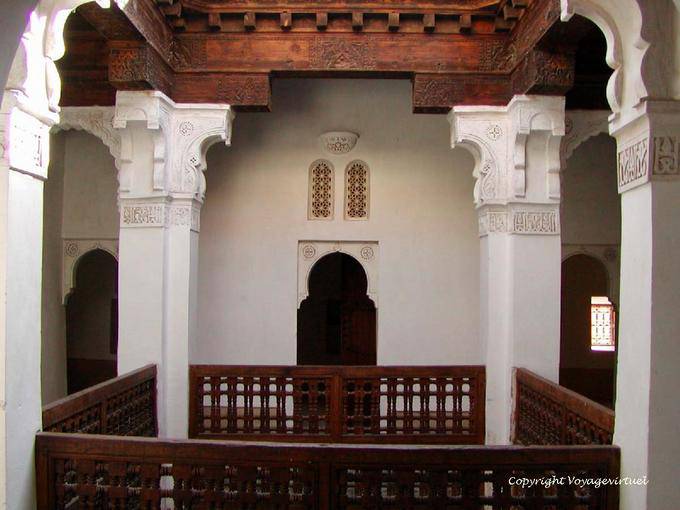 Patio lined with wooden railings turned, Ben Youssef Madrasa, Marrakech - Morocco