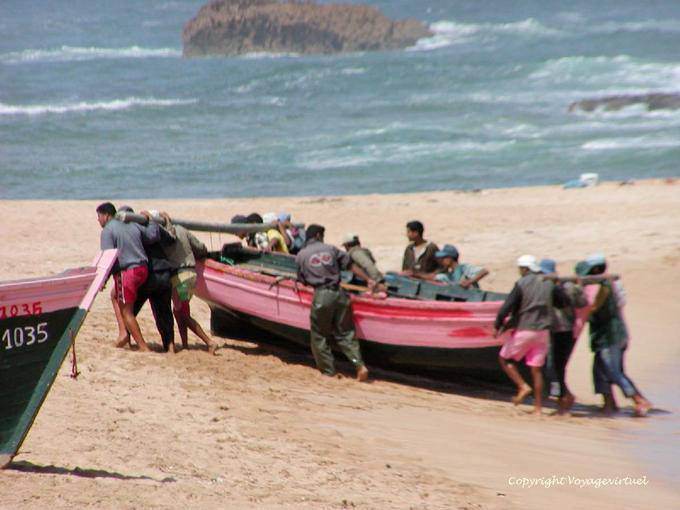 Last effort to transport the boat to safety, Oualidia - Morocco