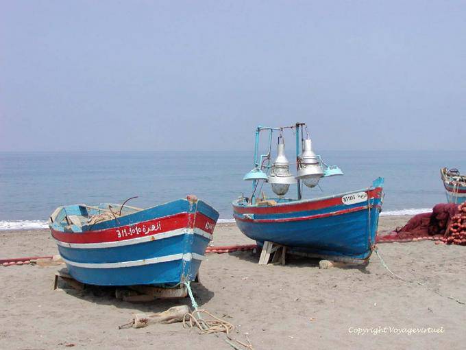 Fishing boats on the beach Oued Lau - Morocco