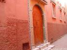 Declination orange on a street, Marrakech, Morocco.