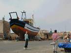 The wooden fishing boat in dry dock on the dock, Essaouira, Morocco.
