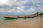 Alignment of fishing boats on the beach, Anse l'Etang, La Caravelle, Martinique.