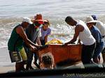 Lift the boat on the beach after fishing, Petite Anse, Martinique.