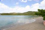 Sand and calm sea in the bay of the Treasury, La Caravelle, Martinique.