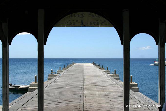 The wooden pier of St. Peter, view from the coast - Martinique