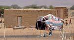 Traditional house and tent outside, Road of Hope, Mauritania.