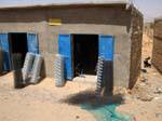 Mesh vendor in Moorish house, Road of Hope, Mauritania.