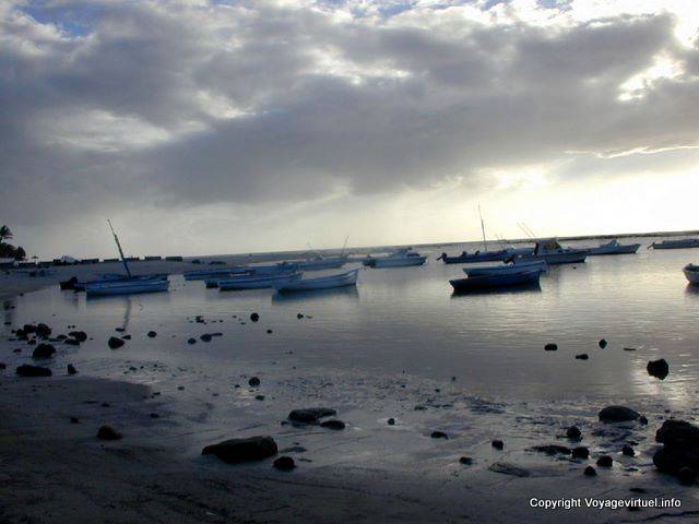 Boats in port at low tide, Flic en Flac, Mauritius.