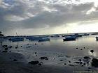 Boats in port at low tide, Flic en Flac, Mauritius.