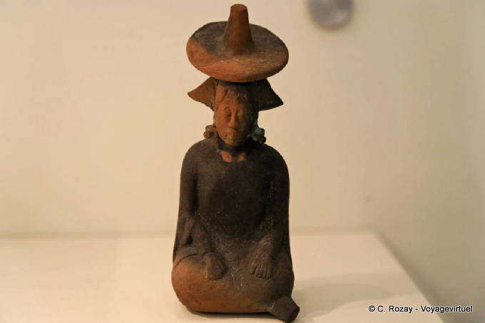 Statuette wearing a traditional hat, Museo Maya Archaeology, Campeche - Mexico