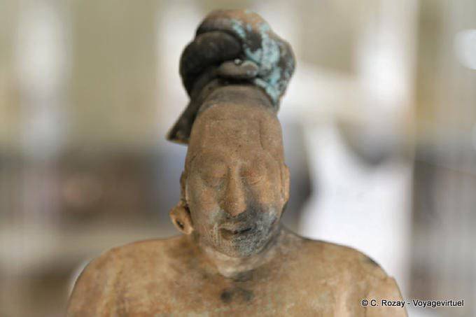 Bust wearing an earring, Museo Maya Archaeology, Campeche - Mexico