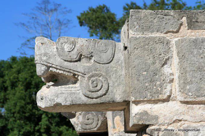Sculptures snake heads on the Casa de las Aguilas, Platform of Venus, Chichen Itza - Mexico