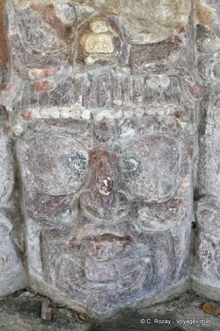 Focus on the mask of the rising sun, Templo de Mascarones, Edzná - Mexico