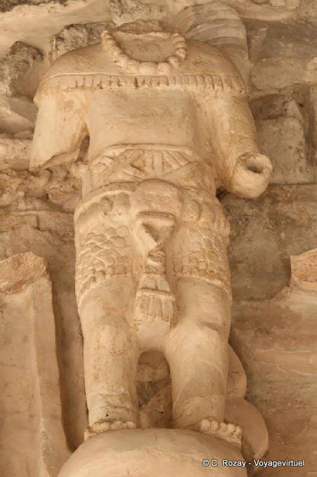 Headless Statue left side of the frieze, Jaguar Altar, Ek Balam - Mexico