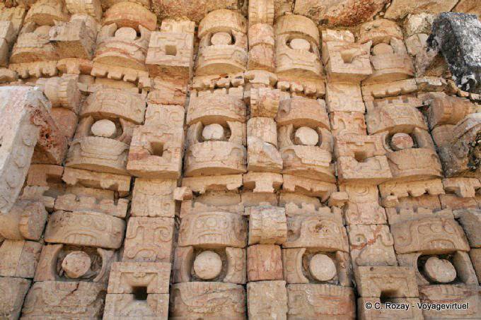 Focus on the masks of Chac, Palace of the Masks, Kabah - Mexico