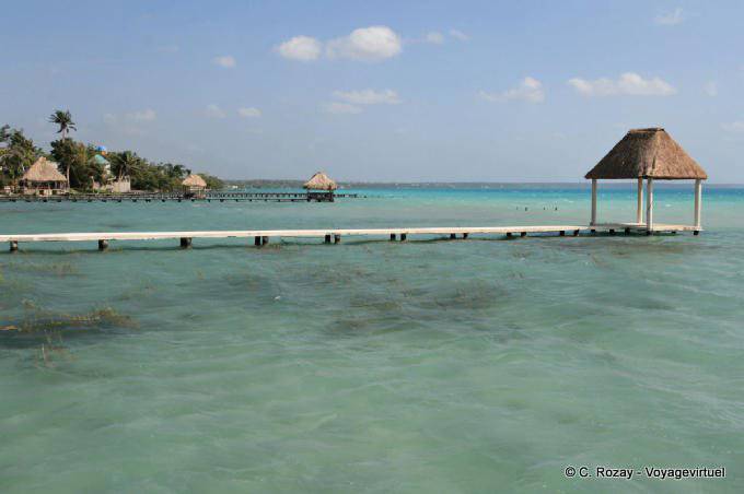 Ponton and huts near a cenote, Laguna Bacalar - Mexico