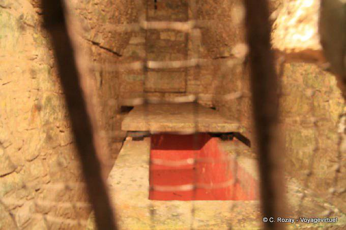 Sarcophagus behind the grille, Palace of the head of Death, Palenque - Mexico