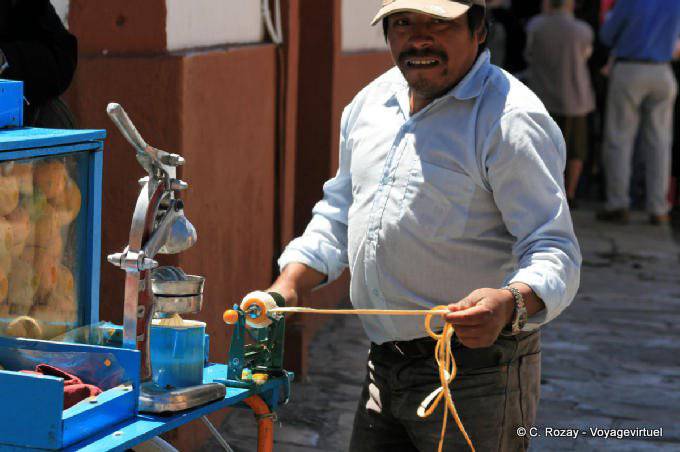 Mechanical peeling oranges, San Cristobal de Las Casas - Mexico