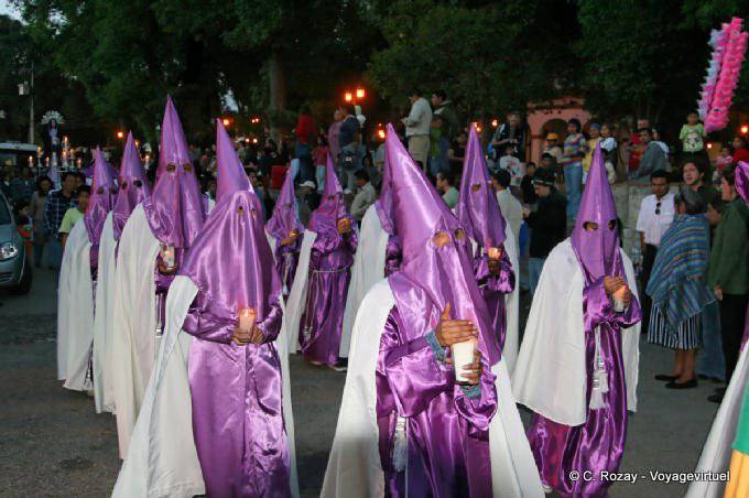 Penitents parade pointy hoods, procession, San Cristobal de Las Casas - Mexico