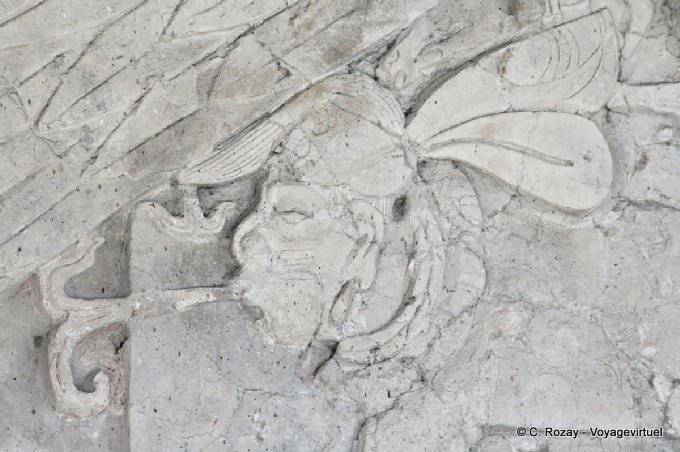 Focus on carved face of the fresco of the four suns, Frieze of the Dream Lords Tonina - Mexico