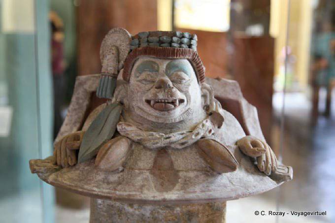 Pottery with chocolate god tongue out, museum Tonina - Mexico