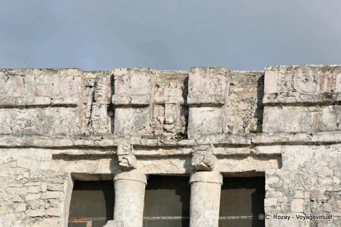 Sculpture of god descending in the central niche, El Castillo, Tulum - Mexico