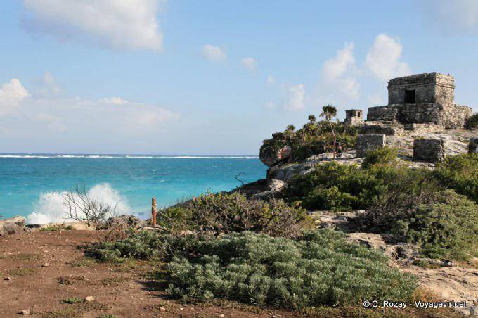 Wave at the foot of the entire Kukulcan, Temple of the God of the Wind, Tulum - Mexico