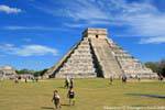 Children on the grass, Pyramid of Kukulcan, Chichen Itza, Mexico.