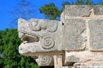 Sculptures snake heads on the Casa de las Aguilas, Platform of Venus, Chichen Itza, Mexico.