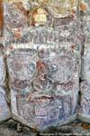 Focus on the mask of the rising sun, Templo de Mascarones, Edzná, Mexico.