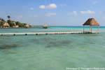 Ponton and huts near a cenote, Laguna Bacalar, Mexico.