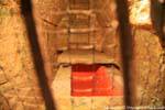 Sarcophagus behind the grille, Palace of the head of Death, Palenque, Mexico.