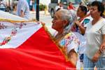 Old woman during a demonstration, Puerto Morelos, Mexico.