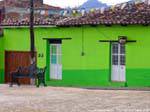 Iron bench in front of the green house, Plazuela del Cerrillo San Cristobal de Las Casas, Mexico.