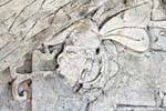 Focus on carved face of the fresco of the four suns, Frieze of the Dream Lords Tonina, Mexico.