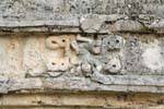 Detail of a sculpture on a wall, Temple of Frescoes, Tulum, Mexico.