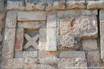 Focus on the sculpture of a parrot, Great Pyramid, Uxmal, Mexico.
