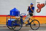 Happy peddler on his tricycle, Valladolid, Mexico.