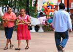 Walkers in the zocalo, Valladolid, Mexico.