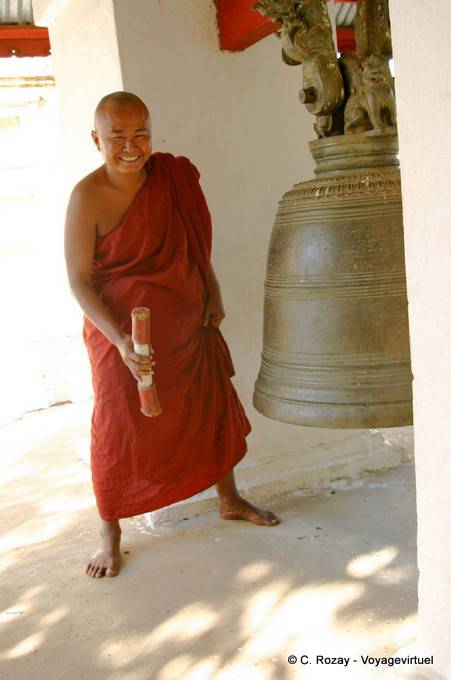 The monk at the bell, Bagan - Myanmar (Burma)
