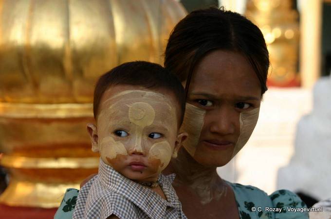 Mother and child with faces covered thanaka, Bagan - Myanmar (Burma)