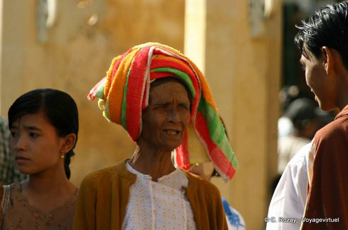 Wearing a multi-colored towel, Bagan - Myanmar (Burma)